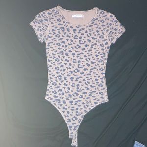 Light brown and black short sleeve bodysuit